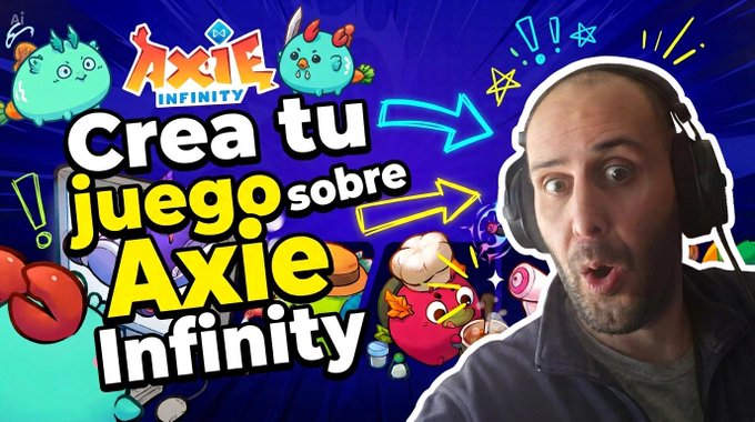A YouTube thumbnail in Spanish reading "Crea tu juego sobre Axie Infinity" featuring Axie Infinity game characters and a surprised bald man wearing headphones on the right.