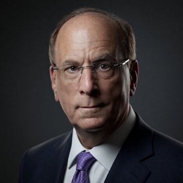 The image features a portrait of a distinguished older man with glasses, wearing a dark suit and purple tie, against a dark background. He appears to be a senior executive at BlackRock, likely related to the post about the firm urging the Bank of Japan to raise interest rates and support the yen.