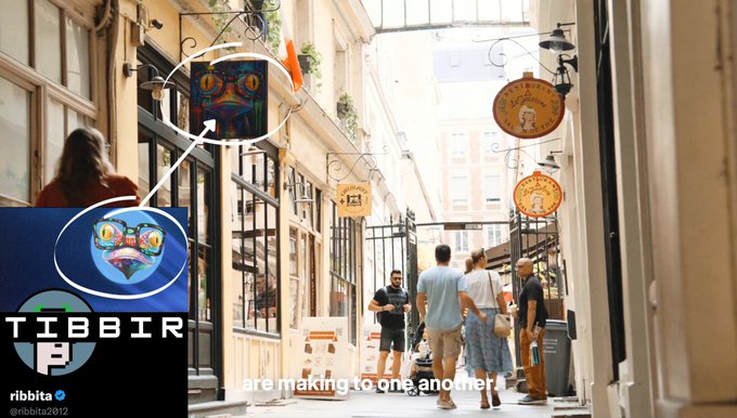 The image shows a charming Paris alleyway with people walking past shops, featuring an overlaid logo and text for "TIBBIR" by @ribbit (Ribbit Capital), with a circled cat-like mascot on a street sign highlighting the location—appearing to showcase the manipulated Paris street sign referenced in the post as a clue for the Ribbita token.