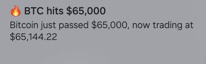 A news alert with a fire emoji reads 'BTC hits $65,000' noting Bitcoin just passed $65,000, now trading at $65,144.22.