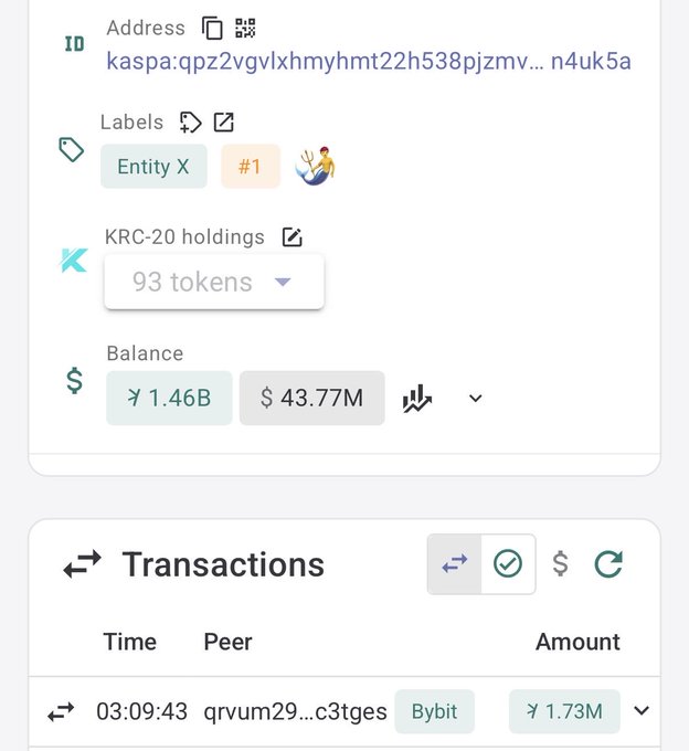 The image presents a snapshot of two cell phone screens, with one displaying information related to a transaction being made over the Kaspa blockchain. The other screen shows the details of another transaction, but not the same as the first one. The screens are side by side in the bottom right corner and both have text and numbers on them, providing relevant information for those involved in this transaction.