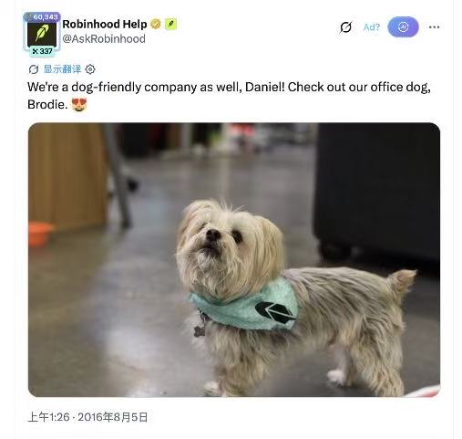 A Robinhood Help tweet stating they are a dog-friendly company, featuring a photo of an office dog named Brodie wearing a bandana.