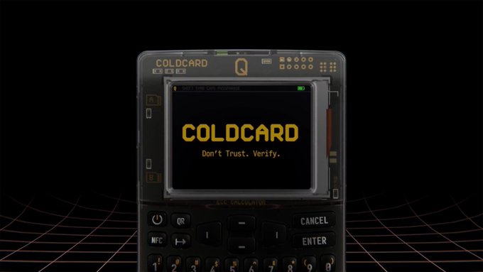 A Coldcard hardware wallet displays its logo alongside the tagline "Don't Trust. Verify." on its screen, set against a dark, tech-inspired grid background. The image illustrates the Coldcard device mentioned in the post, which discusses a firmware update aimed at improving seed generation security and advising users with previously vulnerable seeds to generate new ones.