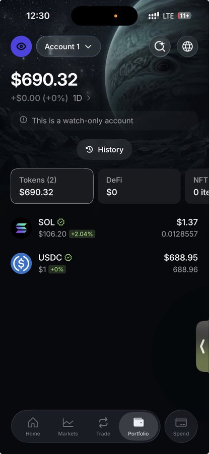The image shows a crypto portfolio screen displaying $690.32, with holdings of $1.37 in SOL ($106.20, +2.04%) and $688.95 in USDC, on a watch-only account marked "Account 1."

The caption illustrates the aftermath of a wallet drain referenced in the post—someone's year-long savings in USDC and SOL were wiped from their wallet after likely interacting with a malicious giveaway link, reinforcing the warning to keep long-term savings separate from active wallets.