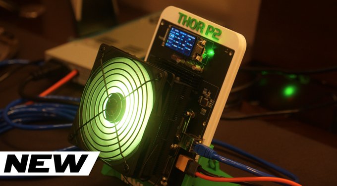A close-up of a 'THOR P2' crypto mining device featuring a cooling fan with green illumination, circuit board, and cables, marked with a 'NEW' label.