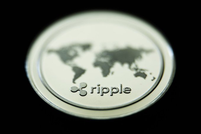 A close-up of a silver coin featuring a world map and the "ripple" logo, symbolizing the XRP cryptocurrency and its global financial network.

The image directly relates to the post by visually representing Ripple/XRP, the foundational "engine" upon which RLUSD is built, reinforcing the message that the two are interconnected rather than interchangeable.