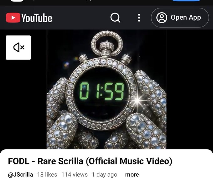 A YouTube thumbnail for the music video 'FODL - Rare Scrilla (Official Music Video)' by @J_Scrilla, showing diamond-encrusted hands holding a pocket watch displaying '01:59'.