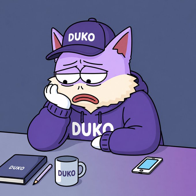An illustrated purple cat-like character wearing a purple hoodie and cap, both branded with 'DUKO', sits at a desk looking tired with a notebook, mug, and phone also bearing the 'DUKO' label.