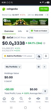A screenshot of the Coinbase app showing the price of Dogecoin (DOGE) at $0.03338, up 94.1% (3m), with a portfolio value of $0.00.