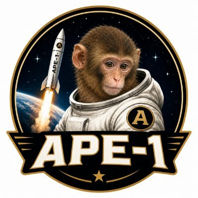 A circular mission patch-style illustration showing a baby chimpanzee in a white astronaut suit with an "A" patch, with a rocket ship labeled "APE-1" in the background and "APE-1" text at the bottom.