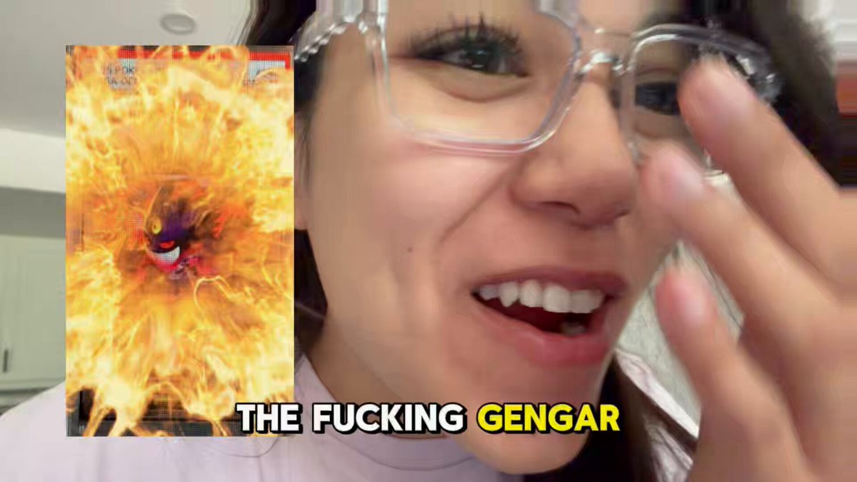 The image features a woman wearing glasses, with her face partially obscured by them. She has a smile on her face as she looks at the camera. The background of the image shows an advertisement for "The Fucking Gengar" movie poster. The text in the image reads "MEGA GENGAR PSA ?".