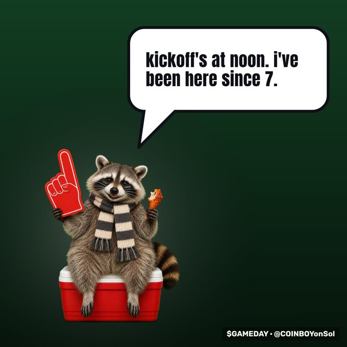 A meme featuring a raccoon wearing a striped scarf, sitting on a red cooler with a foam finger and chicken leg, with a speech bubble reading "kickoff's at noon. i've been here since 7." and watermark "$GAMEDAY - @COINBOYonSol".