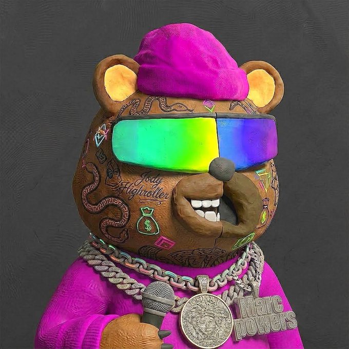 A 3D-rendered anthropomorphic bear character wearing a magenta beanie and sweater, rainbow reflective sunglasses, and multiple chains including one reading 'HAIRC TOWERS', holding a microphone.