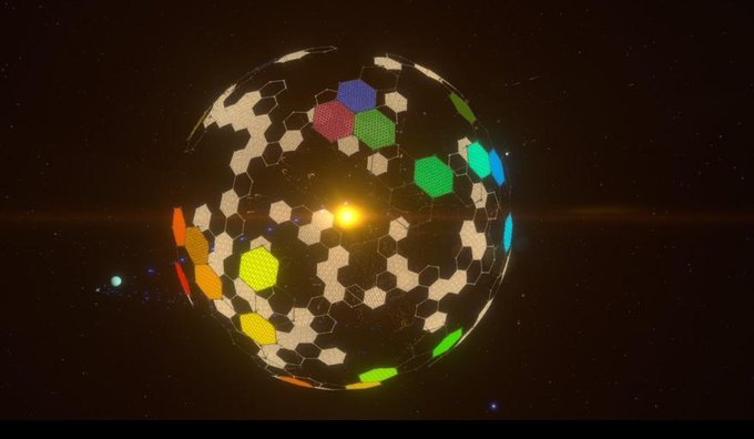 A glowing spherical installation made of honeycomb-like hexagonal panels floats in a dark, space-themed room.