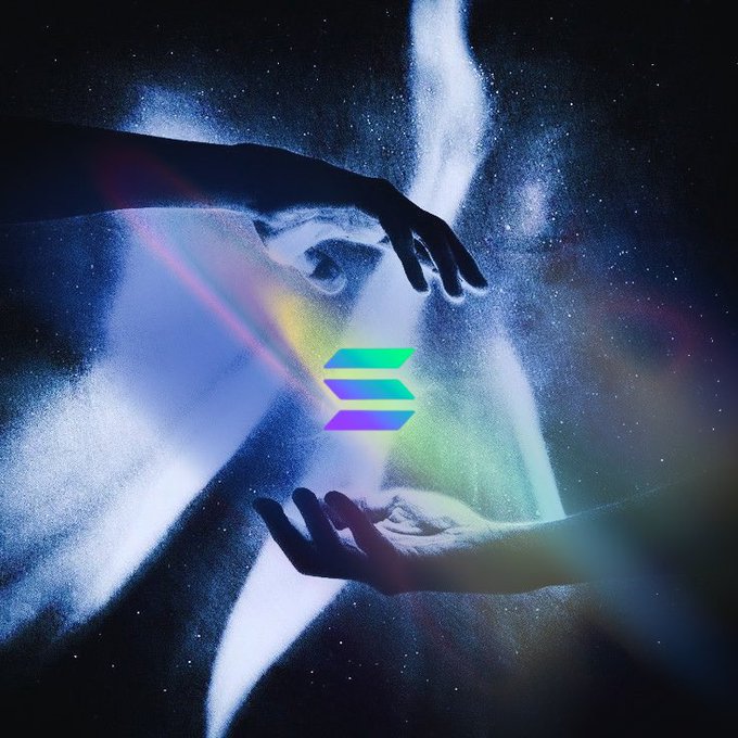 An artistic digital image featuring a hand reaching down and another reaching up, with a glowing rainbow prism pouring light between them; the Solana logo (gradient S) is centered in the composition.