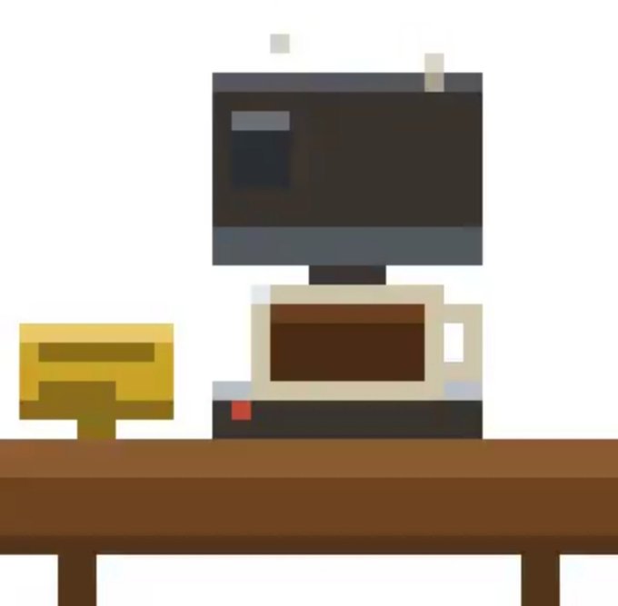 A pixel art illustration showing a simple computer monitor sitting on a desk next to a small wooden cabinet.