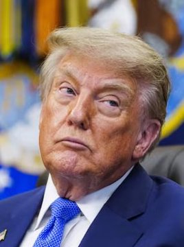 Donald Trump is shown in a close-up portrait wearing a blue suit and blue tie, looking to the side with a serious expression. The image accompanies a breaking news announcement about the Trump administration's push to advance the Clarity Act, with a Senate vote scheduled for that day.