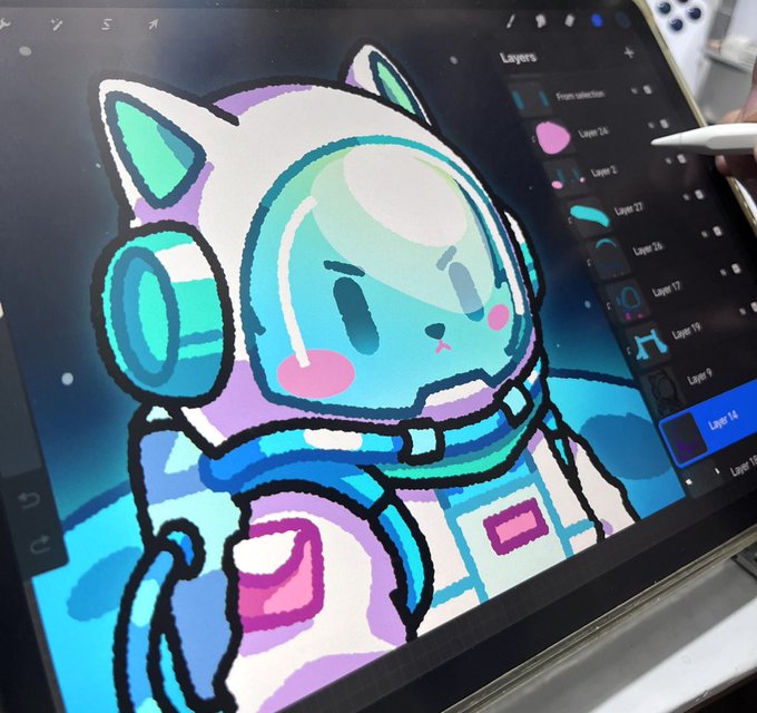 A digital drawing on a tablet showing a cartoon cat character in a space helmet, with the artist's stylus visible and Procreate's layer panel on the right side.