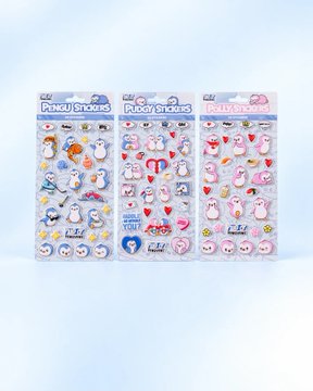 Three packages of puffy stickers featuring cute characters, hearts, and various designs are arranged on a light blue surface.