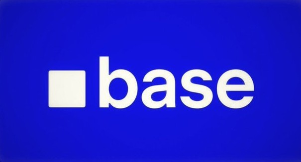The image displays the Base logo, featuring a white square icon next to the lowercase word "base" against a vibrant blue background. This branding visually ties into the post's announcement of the Base ecosystem's B20 milestone being live and upcoming upgrades like Beryl and Cobalt.