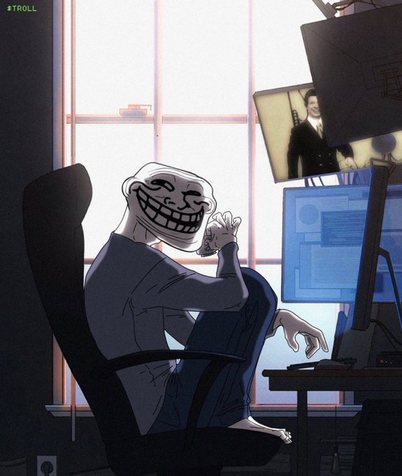 An illustration of a troll face character wearing a blue shirt, sitting in a chair at a desk with multiple monitors in a room, with the text '$TROLL' in the top left corner.