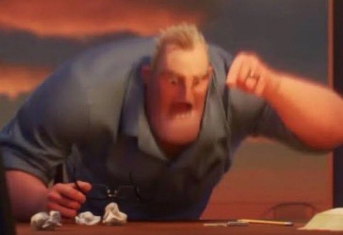 A still from an animated movie showing a muscular man in a blue polo shirt angrily clenching his fist at a desk scattered with crumpled paper.