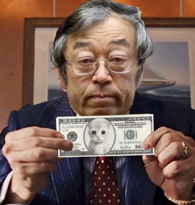 An older man in a suit holding a $100 bill featuring a cat's face instead of Benjamin Franklin.