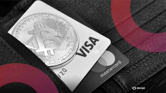 The image shows a black wallet with a silver Bitcoin coin inside of it. The wallet has a red circle around its edge, which appears to be a logo or design element. The text "las tarjetas de criptomonedas ya mueven 660 millones de dólares al mes y reflejan un cambio clave: más utilidad y menos especulación" is written in the image, which seems to be related to Bitcoin or cryptocurrency. The wallet and its contents are placed on a brown background with red circles around it, creating an interesting visual effect that contrasts with the black wallet and silver coin.