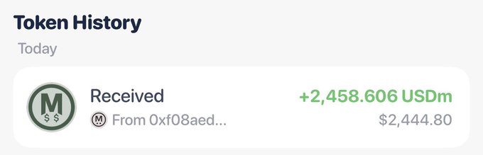The image shows a screenshot of an app called "Megaeth Terminal", which appears to be related to cryptocurrency trading or investing. The app has a green success message, indicating that someone has received money from the app. The text in the image reads "received" and "2,858,664 US dollars". This information is displayed on a screen with a brown background.