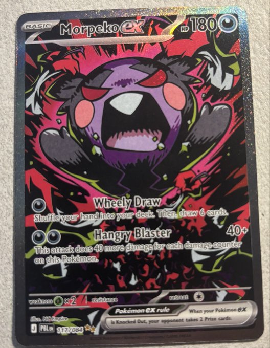A holographic Morpeko ex Pokémon trading card with 180 HP, featuring the attacks "Wheely Draw" and "Hangry Blaster", set against a dark red and black swirling background.