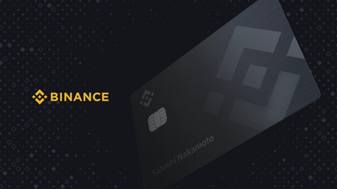 The image features a sleek black Binance Card displayed against a dark pixelated background, with the prominent yellow "BINANCE" logo on the left. The card bears the name "Satoshi Nakamoto" along with the recognizable Bitcoin logo, visually reinforcing the post's announcement that Venezuelan users can now apply for the Binance Card, a crypto-backed payment solution for the Venezuelan market.