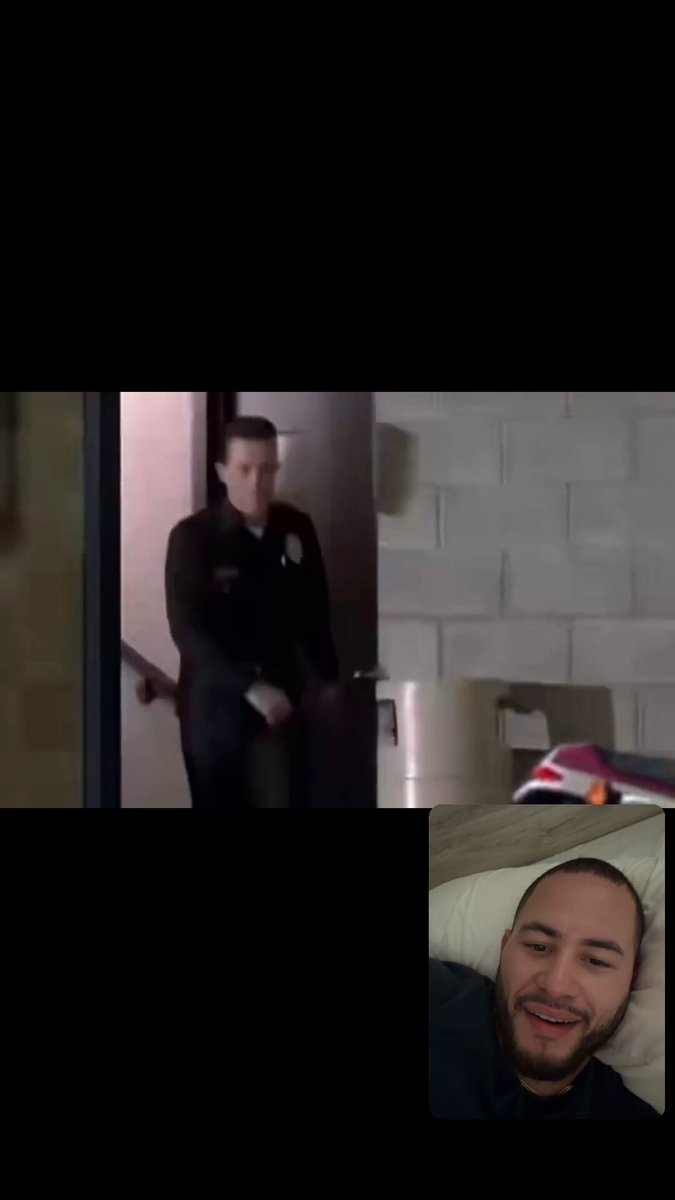 In the image, there are two people present - one person standing behind a door with their back turned towards another person who is sitting down and smiling. The scene appears to be a photo or video of these individuals interacting with each other. The caption on the image reads "The friend you told to buy BTC at 125k". This suggests that someone might have been discussing cryptocurrency, specifically Bitcoin, with this individual in the past.