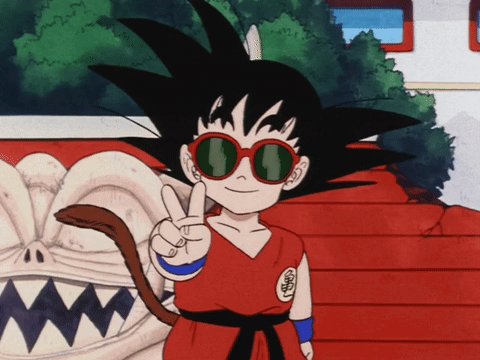 The image features a cartoon character, likely from Dragon Ball Z or another anime, wearing red clothes with green sunglasses and holding up two fingers in peace signs. The post that accompanies this image reads "GM #crypto let's get it. DAY 2". This suggests that the image is related to an event or promotion happening on Day 2 of a particular series or campaign.