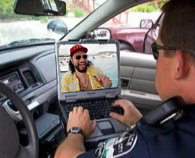 A police officer sits in his vehicle typing on a laptop that displays an image of a man in a yellow patterned shirt, red cap, and gold chains, paired with the caption referencing "$pauly memes" and tagging "@JackDorsey0x." The scene humorously depicts law enforcement "investigating" or engaging with the playful meme, tying into the post's lighthearted internet humor theme.