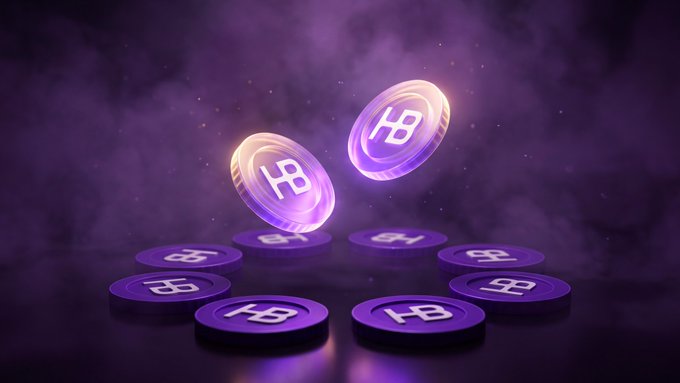 A digital rendering of purple cryptocurrency tokens with an 'X' symbol spinning and floating above a circle of similar coins on a reflective surface with smoky purple ambiance.