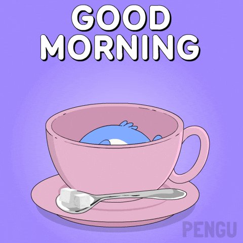 The image features a pink teacup with a blue bird inside, sitting on top of a pink saucer. The cup has a spoon resting on its side next to it. The background of the image is purple, which contrasts nicely with the pink color of the teacup and saucer. The text "Good morning" is written in white above the teacup, while the word "quacks" appears below it.