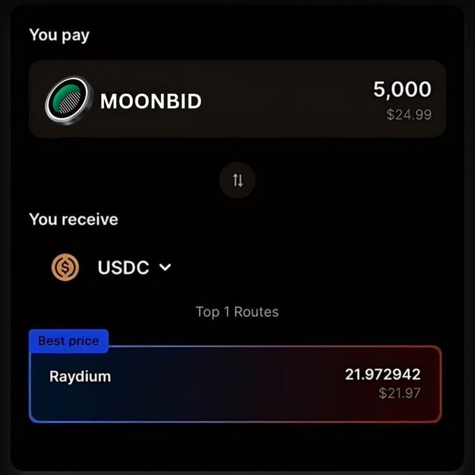 A cryptocurrency exchange interface showing a swap of 5,000 MOONBID ($24.99) for USDC via the Raydium route, receiving 21.972942 USDC ($21.97).