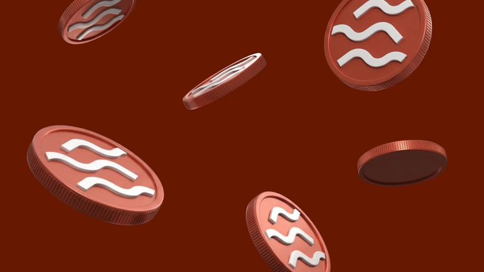 A 3D rendering of several red coins featuring the white Aquarius zodiac symbol, floating against a dark red background.