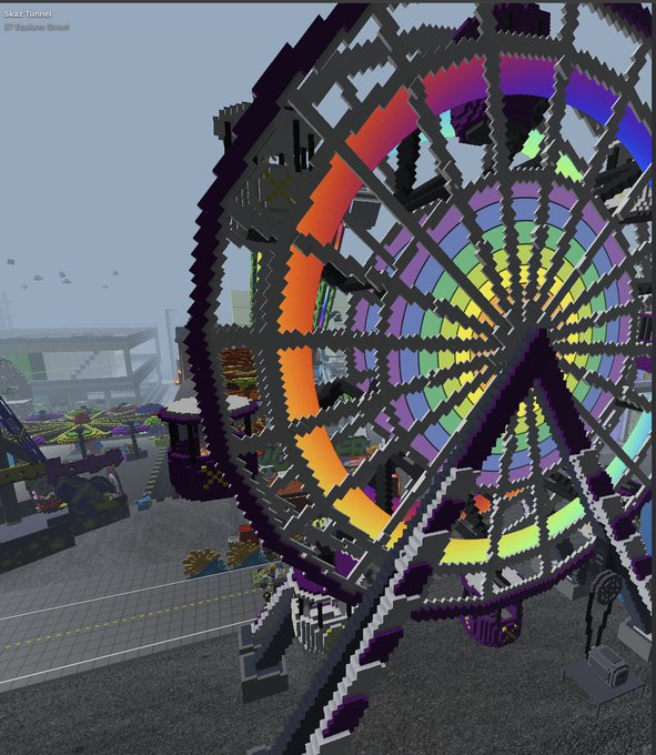 A colorful Minecraft-style digital artwork depicting a rainbow Ferris wheel at what appears to be an amusement park.