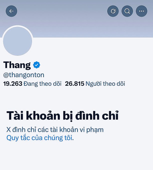 A Twitter profile screenshot for 'Thang' (@thangonton) showing 19,263 following and 26,815 followers, with a notice in Vietnamese reading 'Tài khoản bị đình chỉ' (Account suspended).