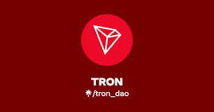 A red background featuring the white TRON logo (a stylized paper plane) above the text "TRON" and the social handle "✱/tron_dao," visually branding the post about TRON's 8.7% Q2 2026 daily trading volume growth.