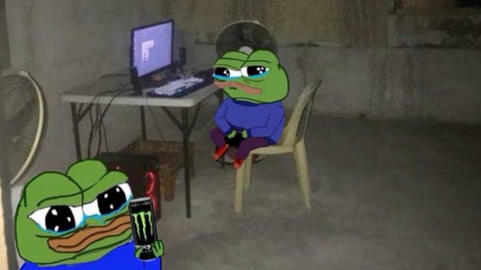 A meme featuring sad Pepe the Frog characters in a dimly lit basement, with one sitting at a computer while another holds a Monster energy drink in the foreground.