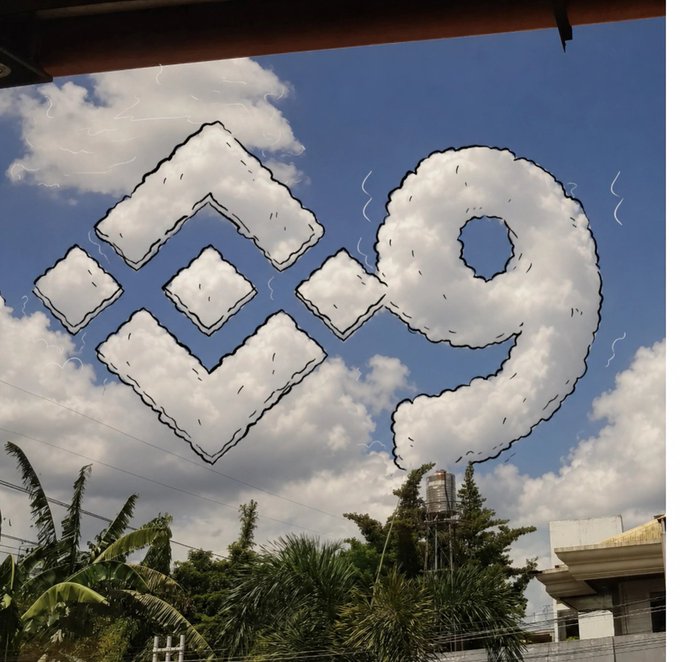 The image features a drawing of a cloud made up of nine squares, with the number 9 written inside each square. The clouds are drawn in black and white, giving them an artistic appearance. The background includes trees and buildings, adding depth to the scene. The caption "币安九周年即将到来 Binance' s #9th anniversary is coming soon" suggests that this drawing might be related to a celebration or milestone for Binance, which is a cryptocurrency exchange platform.