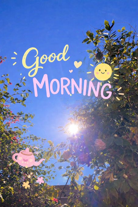 A bright outdoor scene with the sun shining through green leaves, overlaid with 'Good Morning' text, a smiling sun, and a teapot graphic.