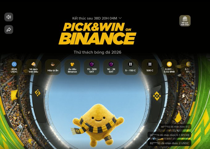 The image shows a promotional poster for Pick & Win on Binance, featuring a cartoon character wearing a scarf with the words "pick&win" written above him. The poster also includes text in Vietnamese and English, as well as images of people attending a sporting event. The background of the poster is black, which contrasts with the yellow and green colors used for the promotional elements.