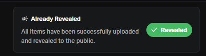 A notification screen displaying a megaphone icon with the text "Already Revealed" and "All items have been successfully uploaded and revealed to the public," accompanied by a green "Revealed" button with a checkmark.