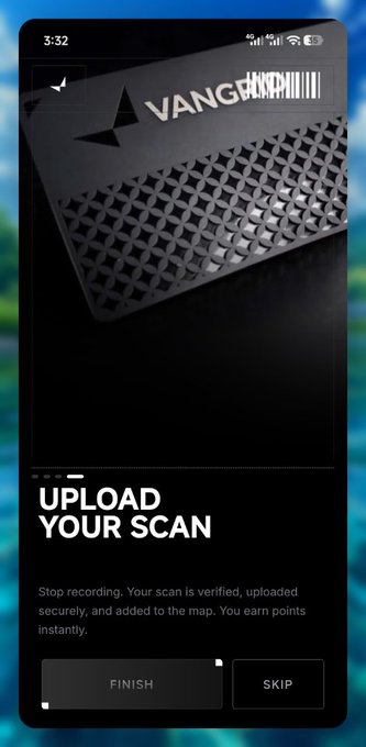A mobile app screen displays a black card with 'VANGUARD' text and a pyramid logo, above the heading 'UPLOAD YOUR SCAN' with instructions and 'FINISH' and 'SKIP' buttons.