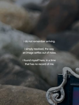 A photograph shows blurred, dark rocks in the background, with a black and white image frame visible in the lower right corner. Overlaid text reads: "i do not remember arriving. i simply resolved, this way an image settles out of noise. i found myself here, in a time that has no record of me." The caption "æon · coming soon" suggests this image is a teaser image for an upcoming project or release, possibly an album, film, or art series.
