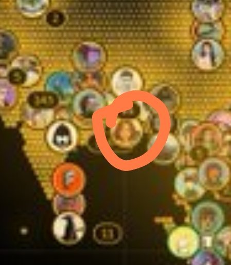 A close-up screenshot showing a cluster of circular user profile icons with one in the center highlighted by a hand-drawn red circle.