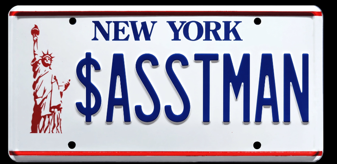 A New York license plate features the Statue of Liberty graphic alongside the text "NEW YORK" and "$ASSTMAN" in bold blue lettering, with the "$" cleverly incorporated into the plate design. The image appears to reference the ticker symbol "$ASST" mentioned in the post, with "ASSTMAN" possibly serving as a playful or promotional tagline associated with the ticker.
